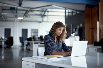 Woman working at a laptop