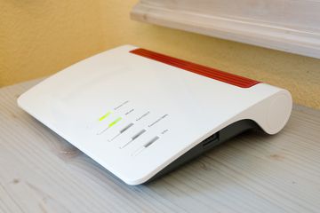 White router on tabletop in a home