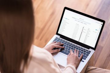 A woman using Google Drive on a laptop