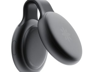 A clip-in microphone in black that looks like some maracas or a FitBit