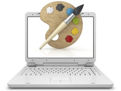 Computer with paint and paintbrush