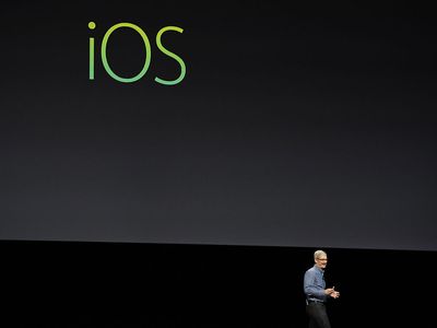 Tim Cook onstage at WWDC discussing iOS