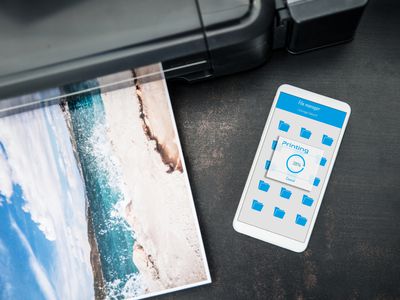 A smartphone sending a photo to a printer 