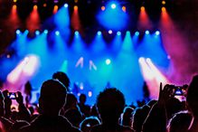 Lights washing the stage at a concert