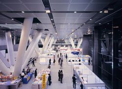 Retailers with display booths at a trade fair