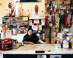 woman working at a wholesale merchandise shop in bodega