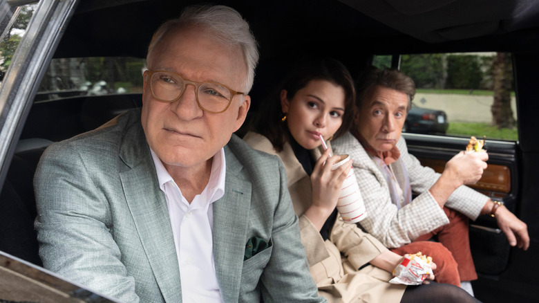 Charles, Mabel, and Oliver in car