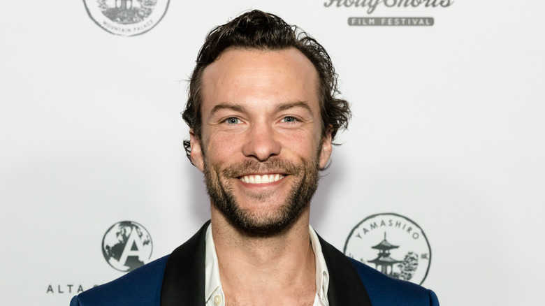 Kyle Schmid smiling