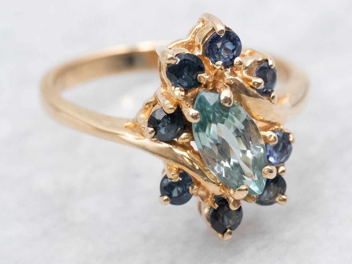 Marquise-Cut Blue Zircon and Sapphire Halo Bypass Ring