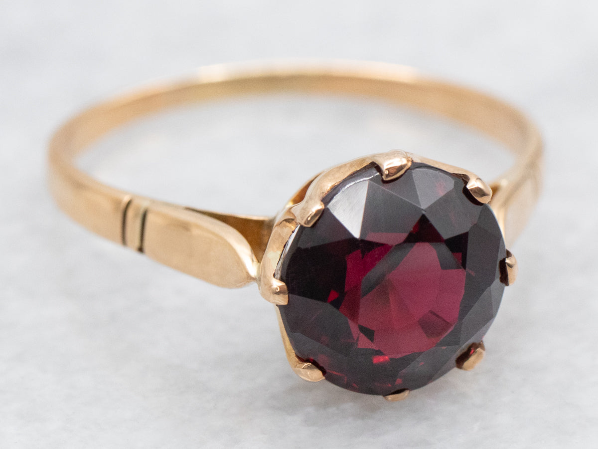 Garnet Solitaire Ring set in Vintage Gold Mounting