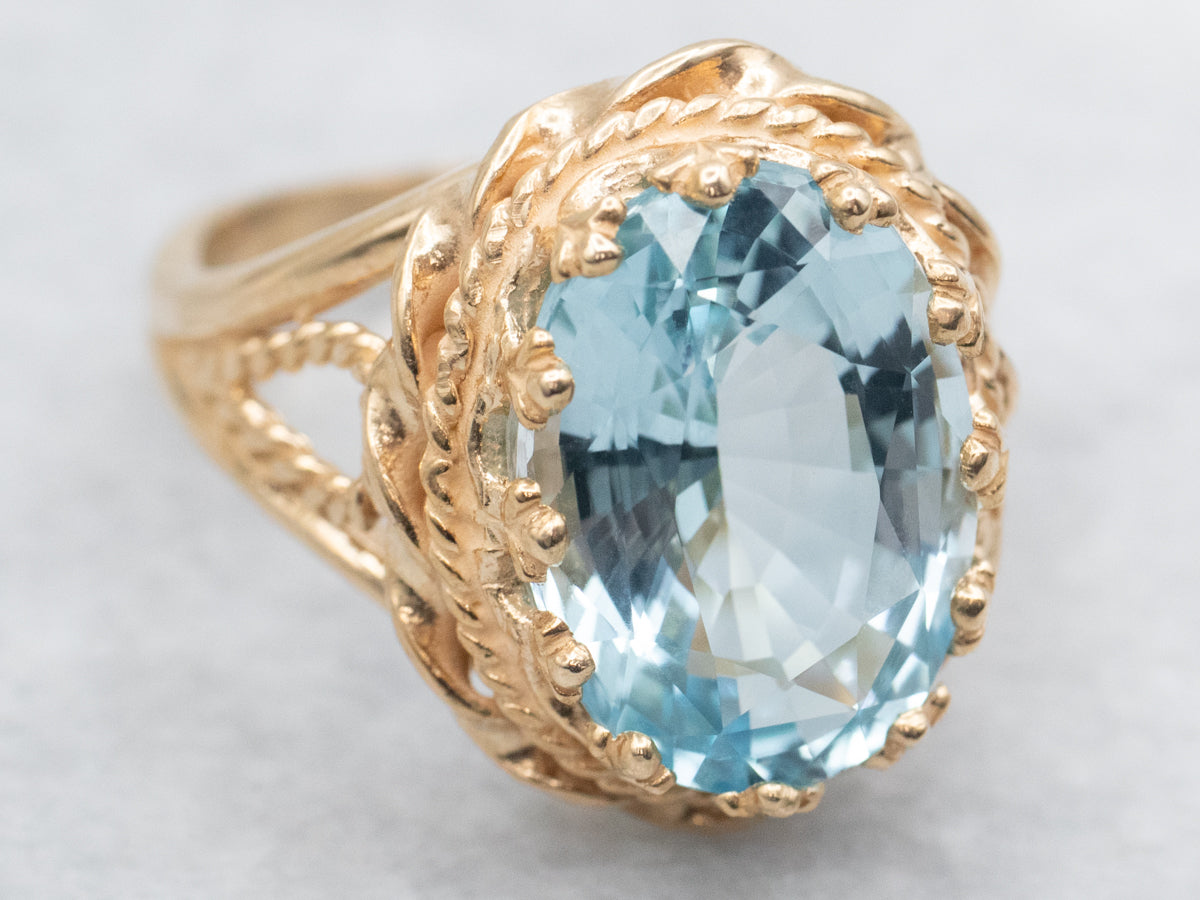 Nautical Gold Blue Topaz Solitaire Ring