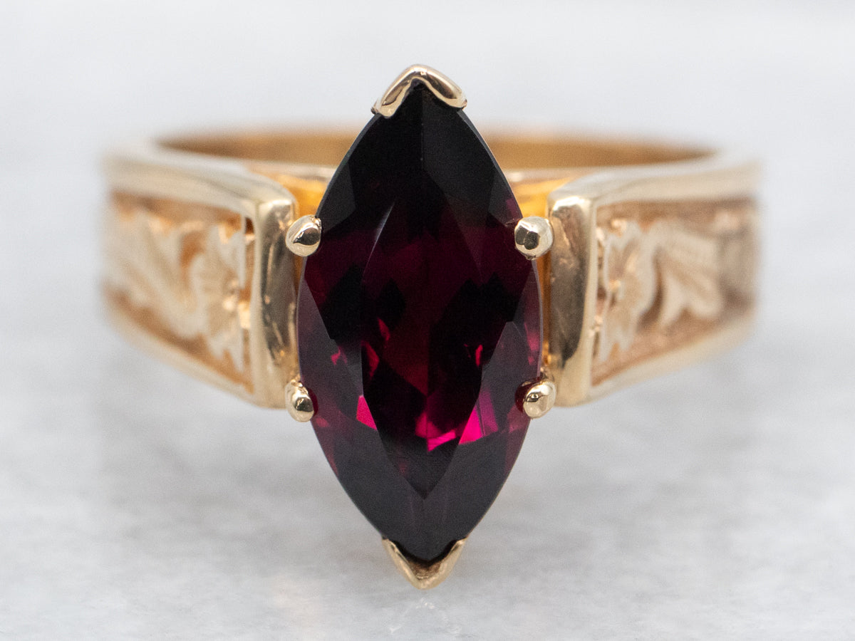 Marquise Cut Garnet Solitaire Ring with Floral Shoulders