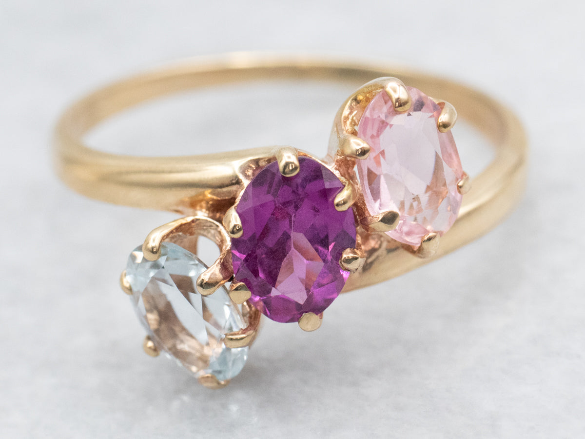 Pink Tourmaline Aquamarine and Garnet Bypass Ring