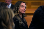 Karen Read listens as judge Beverly Cannone reads a note from jurors, which stated they could not reach a unanimous verdict, during Read’s trial at Norfolk Superior Court, Friday, June 28, 2024, in Dedham, Mass. Read, 44, was charged with second-degree murder after being accused of running into her Boston police officer boyfriend with her SUV in the middle of a nor'easter and leaving him for dead after a night of heavy drinking. (AP Photo/Charles Krupa, Pool) 