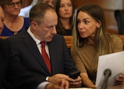 Karen Read, right, showed a piece of paper to her lawyer David Yannetti as she appeared during a hearing at Norfolk Superior Court.  (Jessica Rinaldi/Pool)