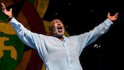 Eddie Levert, of the O'Jays, greets fans on the Congo Square Stage during the New Orleans Jazz & Heritage Festival in New Orleans, Sunday, April 28, 2019. (AP Photo/Sophia Germer)