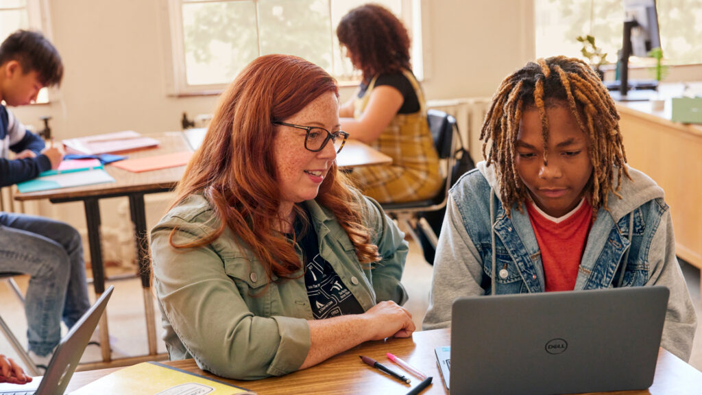 Teacher engaging with one of her students.