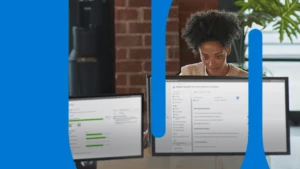 Enterprise office worker in focused work at a computer.