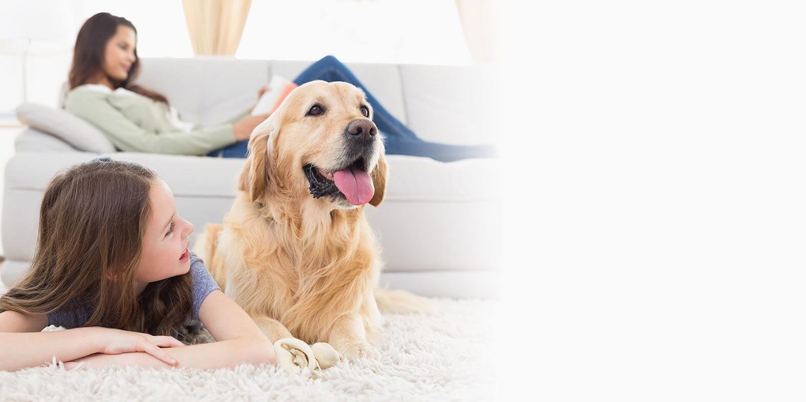 mom and daughter with dog