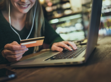 Woman looking at her credit card