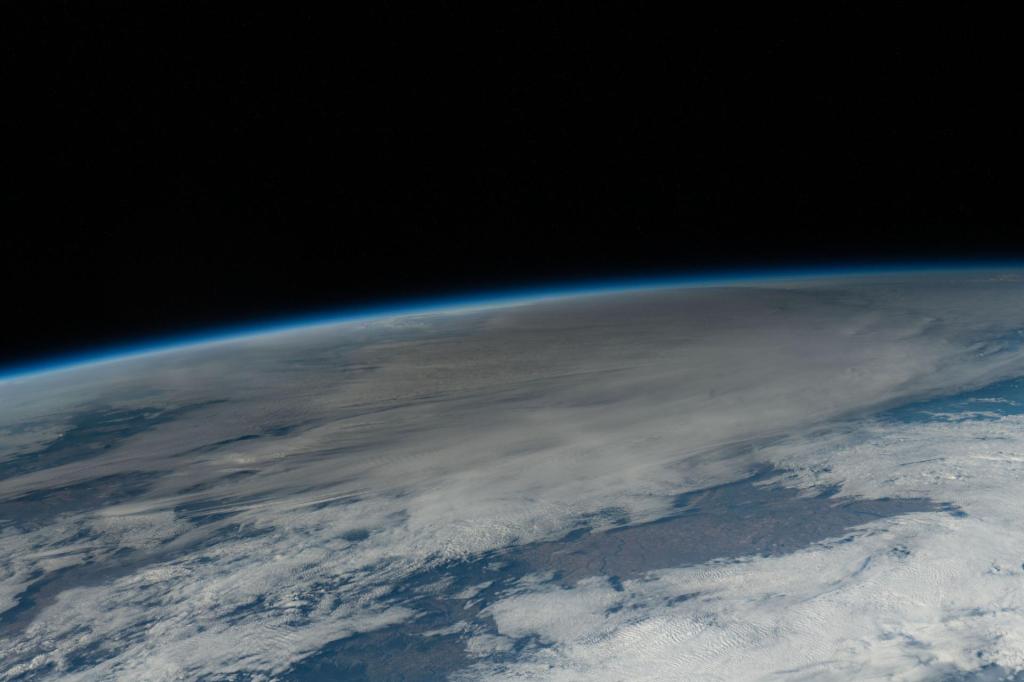 In this photo taken from the International Space Station, the Moon passes in front of the Sun casting its shadow, or umbra, and darkening a portion of the Earth's surface above Texas during the annular solar eclipse Oct. 14, 2023.