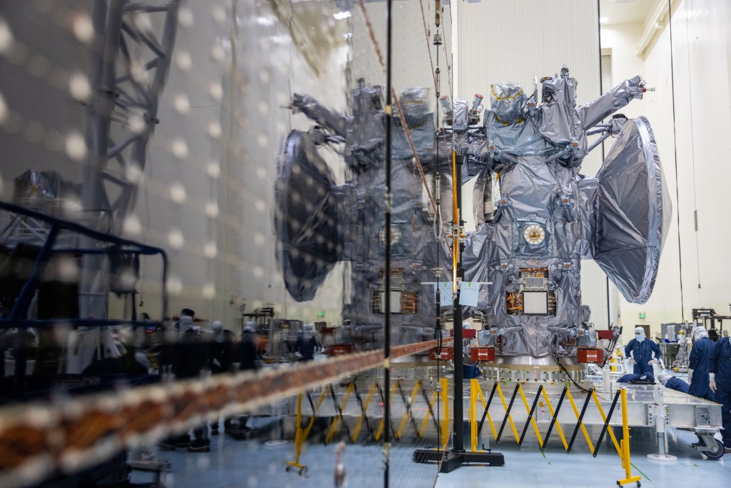 Technicians move NASA’s Europa Clipper spacecraft inside the Payload Hazardous Servicing Facility to accommodate installation of its five-panel solar array at the agency’s Kennedy Space Center in Florida.