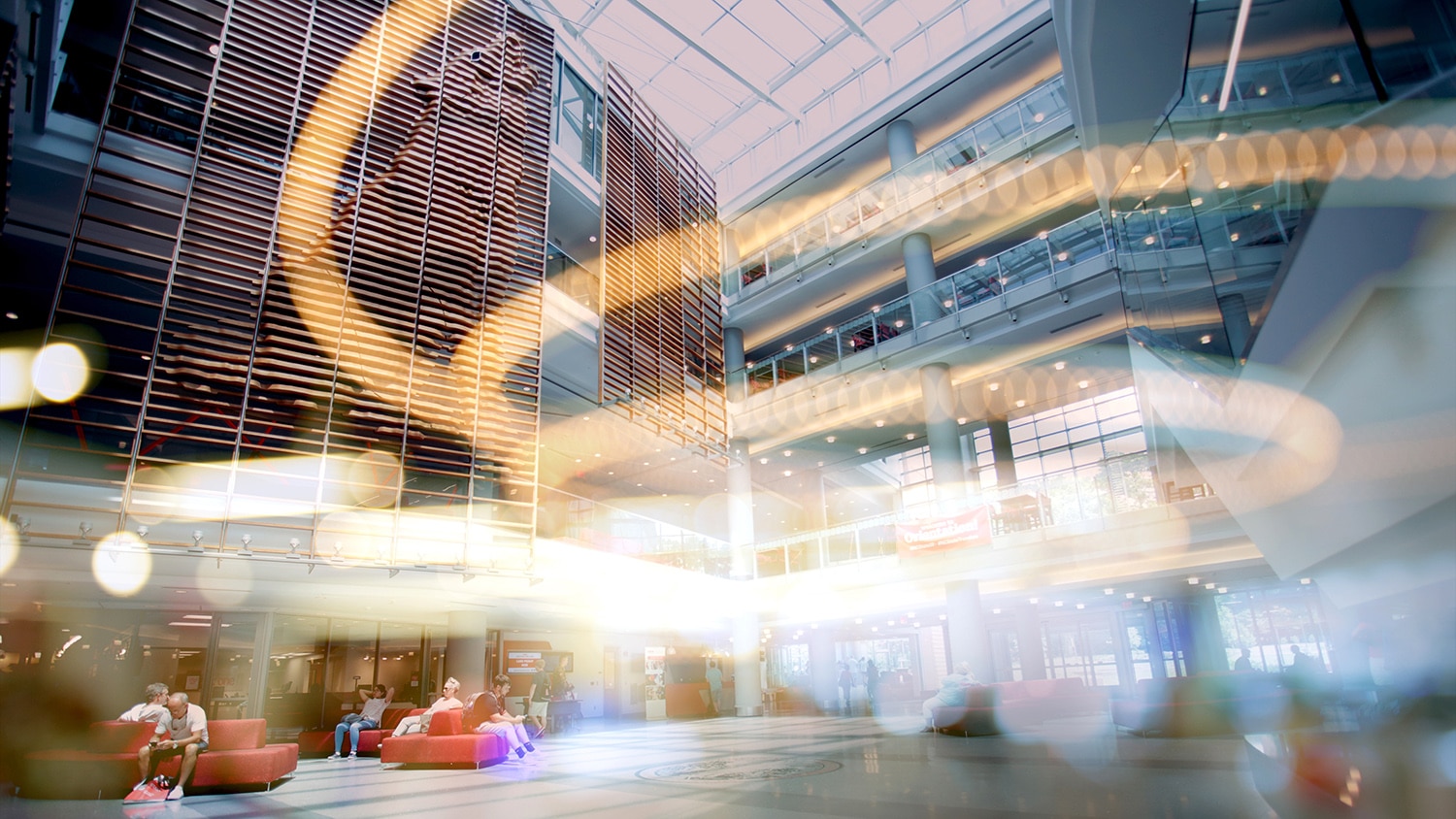 A stylized image of lights inside NC State's Talley Student Union.