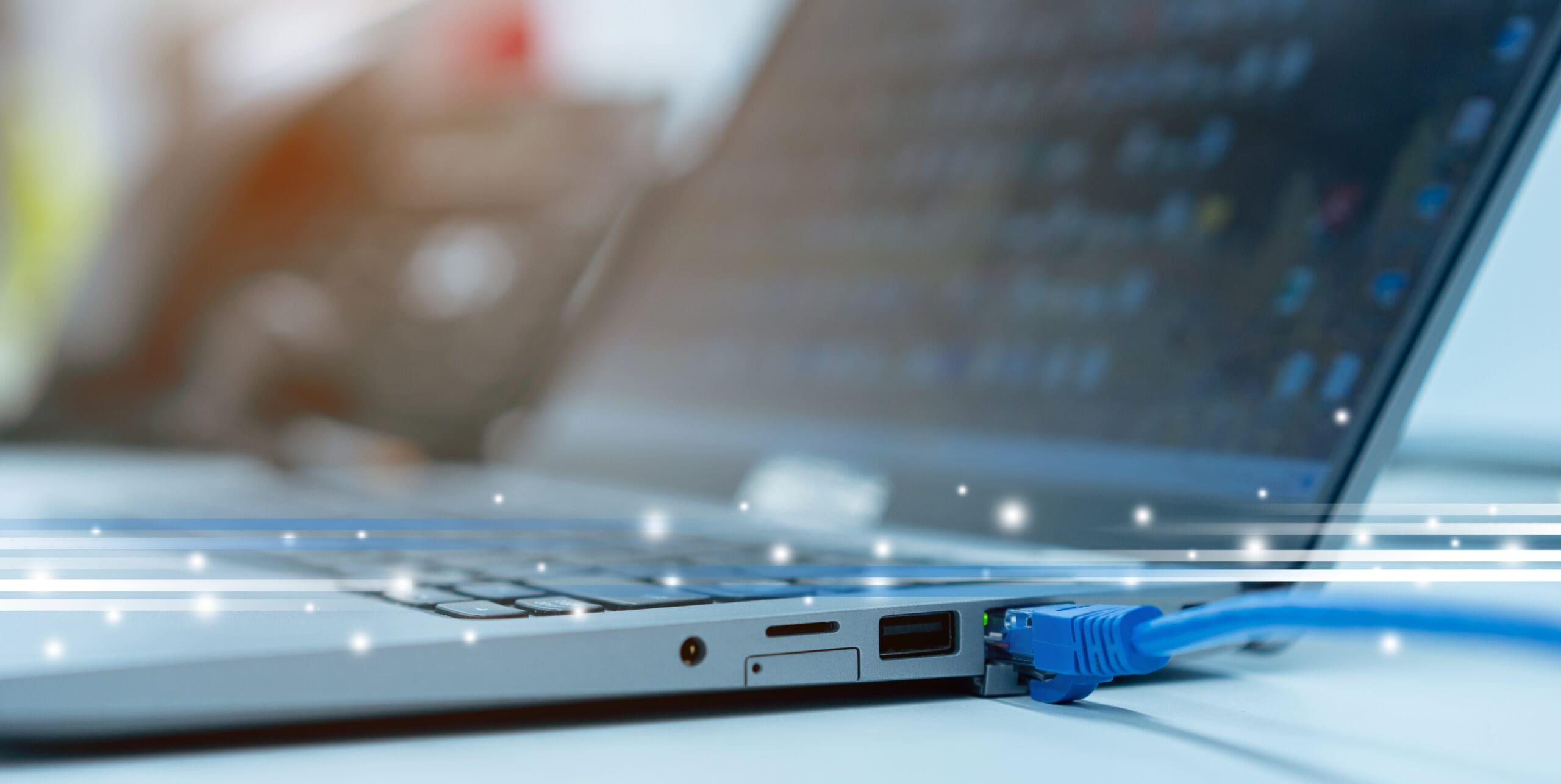 close up on computer port interface with blue line lan cable connected to transfer bandwidth and usage internet data to global network for internet technology transmission service concept