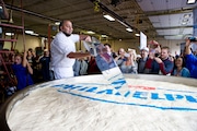 Celebrity chef Duff Goldman with the world's largest cheesecake in 2013 at the ninth annual Lowville Cream Cheese Fest in Lowville, NY. Provided photo | The Associated Press