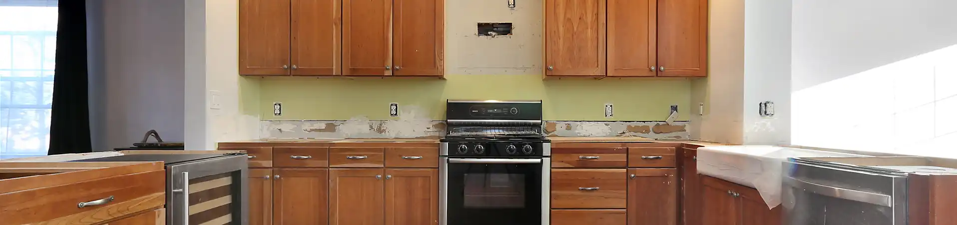 Photo of kitchen with old cabinets before refinishing