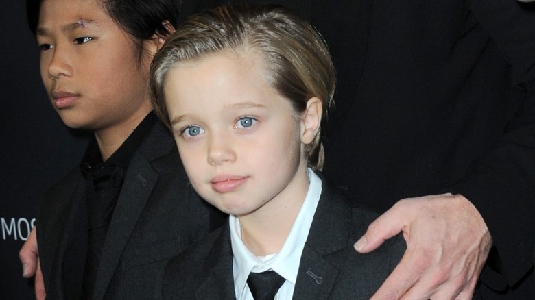 Shiloh Jolie-Pitt wearing tie