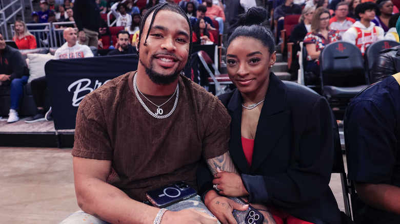 Jonathan Owens and Simone Biles smiling