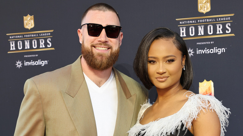 Travis Kelce and Kayla Nicole posing