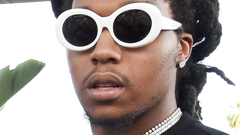 Takeoff performing onstage