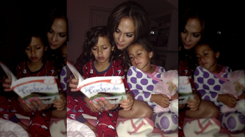 Jennifer Lopez reading to Max and Emme