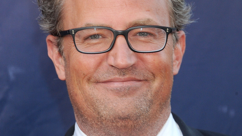 Matthew Perry wearing glasses