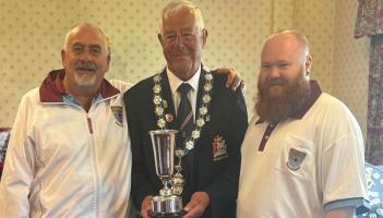 Tony Kwiecien and Rhys Eyles being presented with the Grater Pairs Trophy