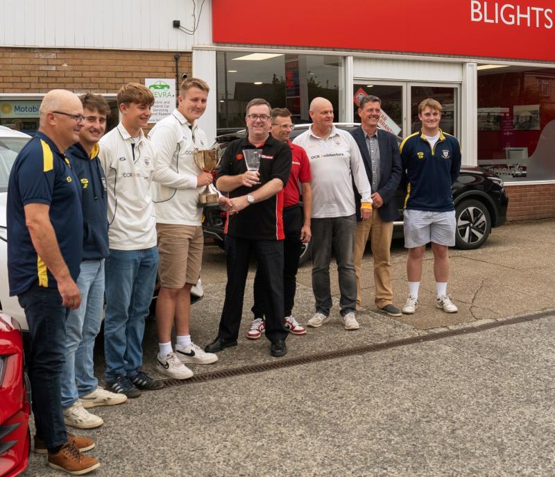 Tim Blight from the Blights Motors Division North Devon League presents Bideford captain James Greenleaf with their First Division trophy