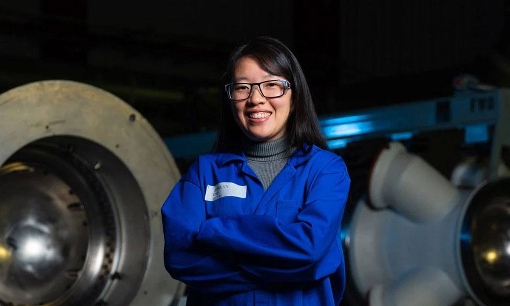 woman in blue clean suit