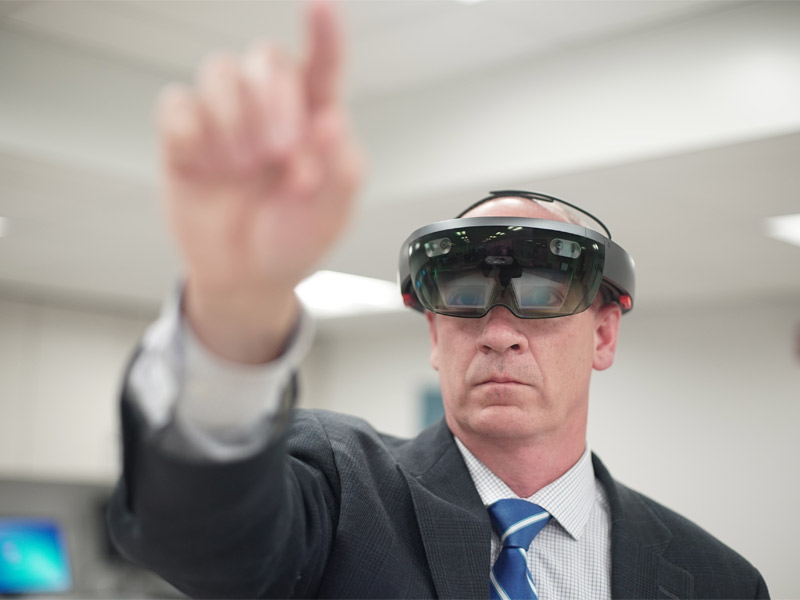 A man wearing an augmented reality headset. 