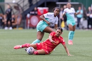 Portland Thorns forward Sophia Smith hits the turf after a foul during an NWSL match against the KC Current at Providence Park on Sunday, June 23, 2024. 