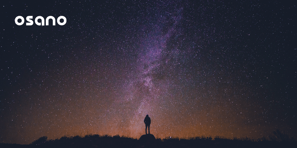 Silhouette of a person against the milky way