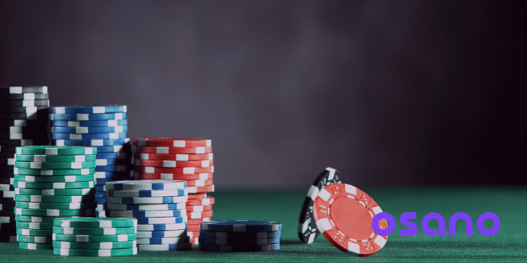 Poker chips on green felt