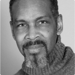 Black and white portrait of Kevyn Morrow.