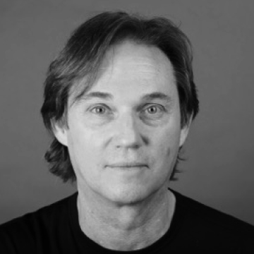 Black and white portrait of Richard Thomas.