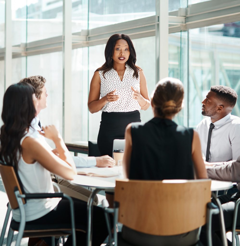 Black woman giving a presentation