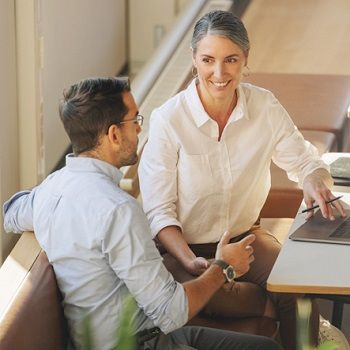 A Patelco Home Loan Consultant helps a member refinance their mortgage.