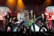 Paweł Maciwoda, from left, Rudolf Schenker, Matthias Jabs and Klaus Meine, of the band Scorpions perform at the Rock in Rio music festival in Rio de Janeiro, Brazil, early Saturday, Oct. 5, 2019. (AP Photo/Leo Correa)