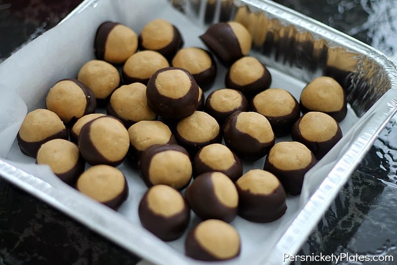 tray of chocolate dipped peanut butter balls