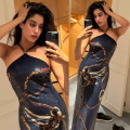 Janhvi Kapoor’s dazzling dark blue halter neck Ralph Lauren gown look is enough to make us go weak in the knees 